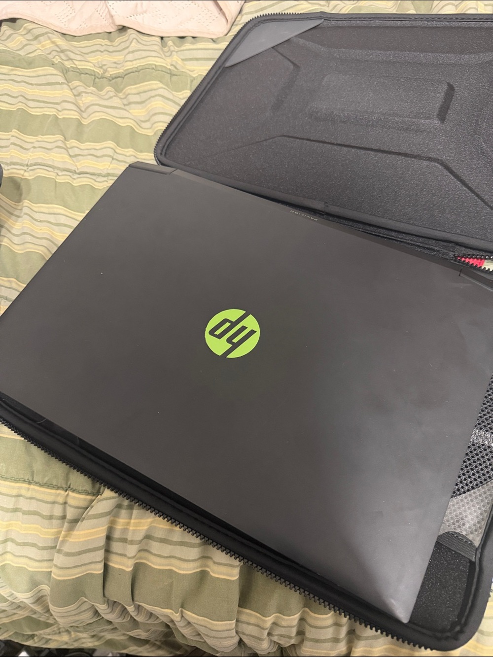HP Laptop with Black Chassis and Green Backlit Keyboard